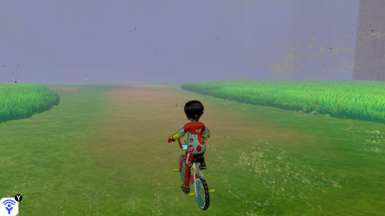 The player bicycles around aimlessly in the vicinity of the Nursery. Sandstorm weather obscures most of the environment.